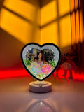 Ayat Gifts heart-shaped magic mirror with personalized photo, illuminated LED lights, and decorative flowers