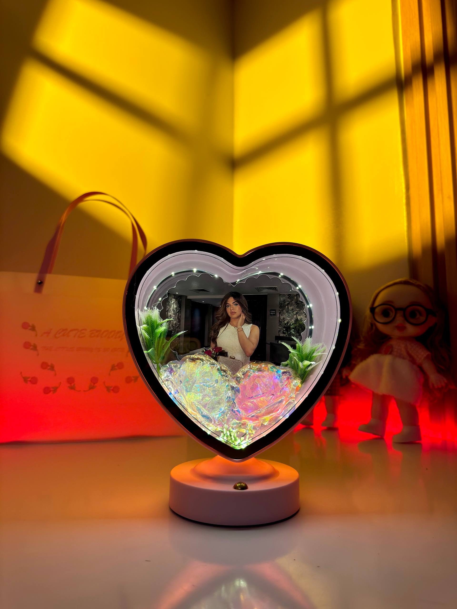 Ayat Gifts heart-shaped magic mirror with personalized photo, illuminated LED lights, and decorative flowers
