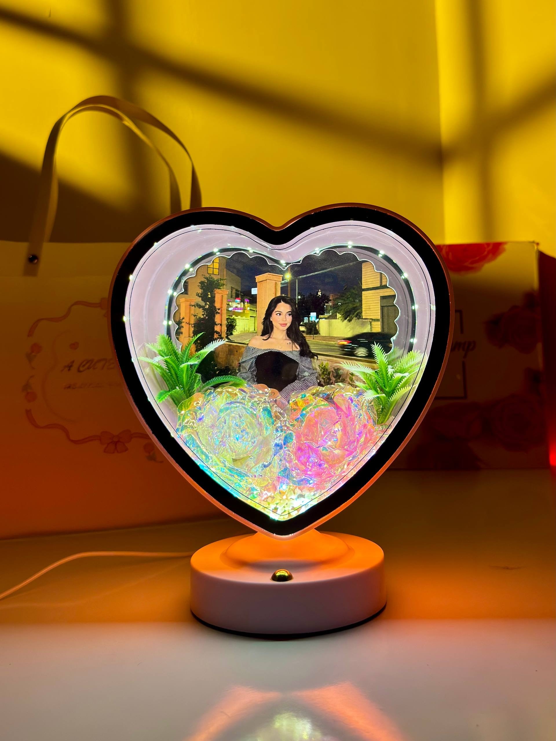 Ayat Gifts heart-shaped magic mirror with personalized photo, illuminated LED lights, and decorative flowers