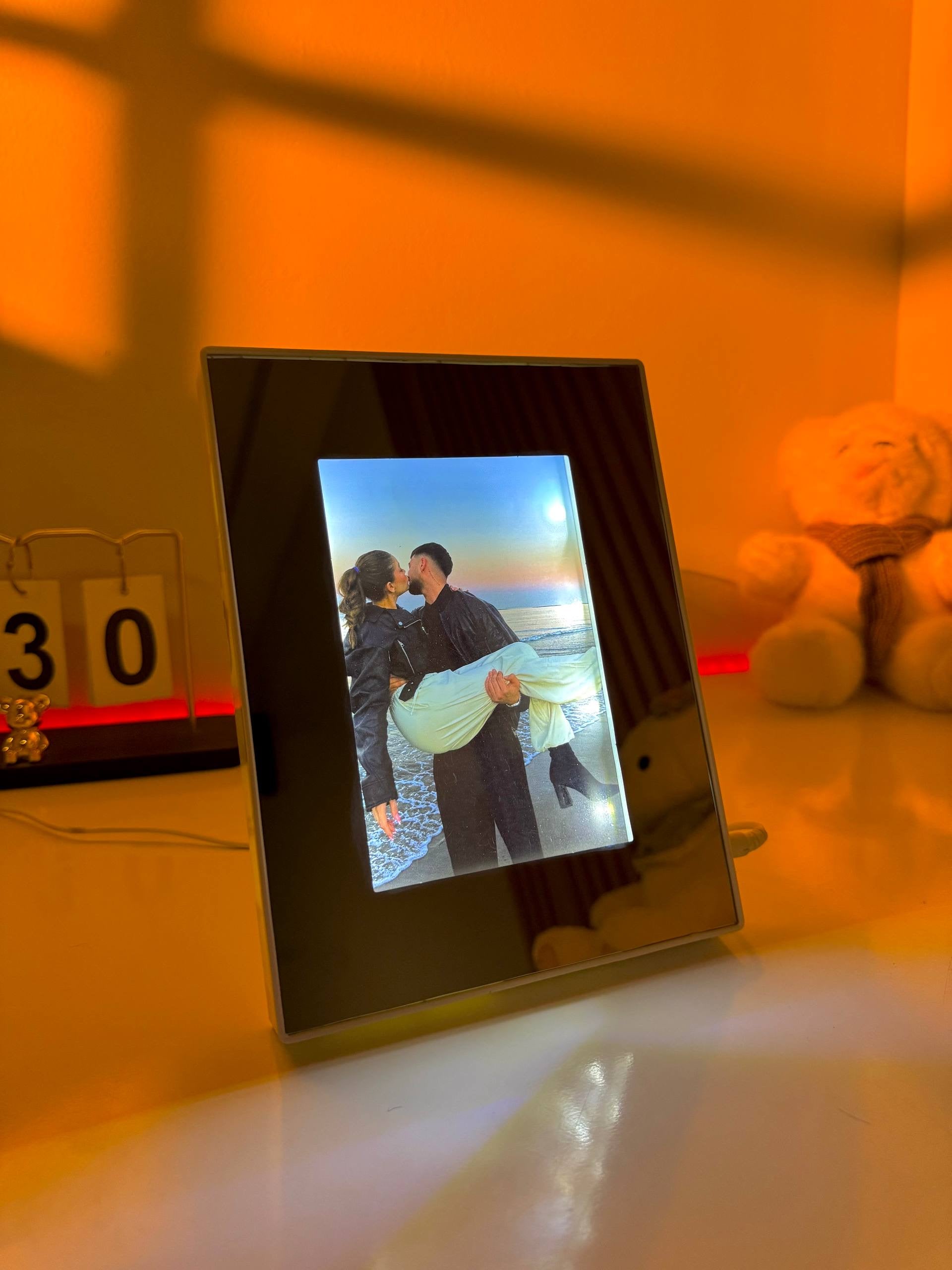 Ayat Gifts personalized magic mirror photo frame displaying a romantic couple photo