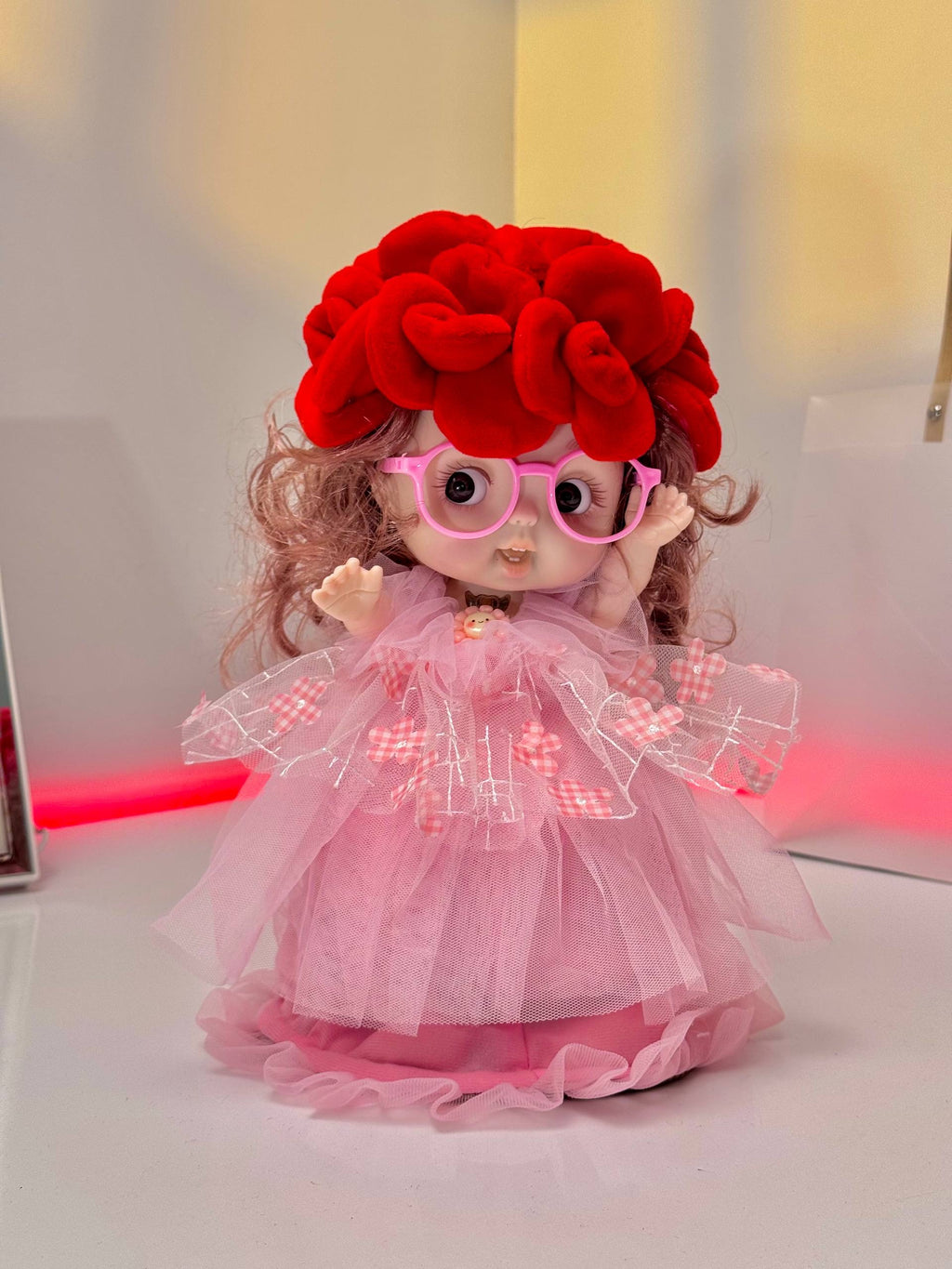 Blooming celebration doll bouquet that opens into a cute musical light\-up doll