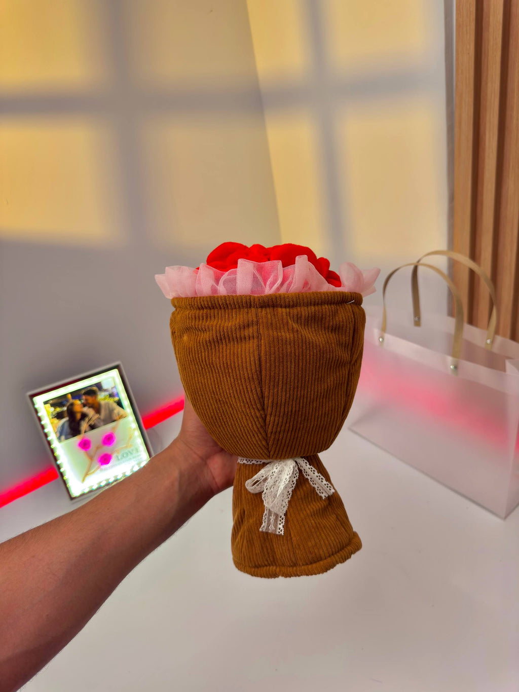 Blooming celebration doll bouquet that opens into a cute musical light-up doll