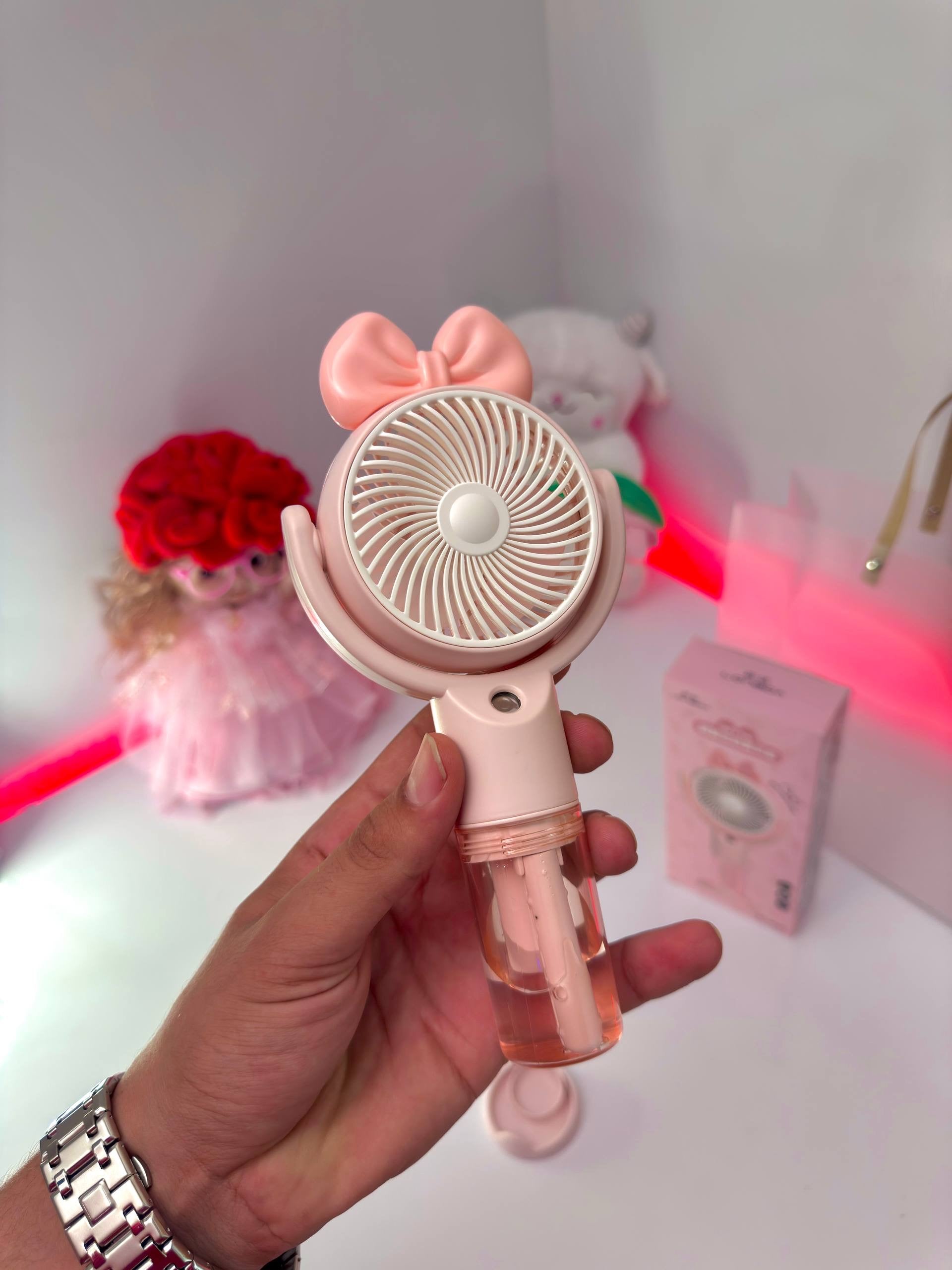 Image Alt Text:
Portable mini fan with water mist function, three speed levels and Type-C charging