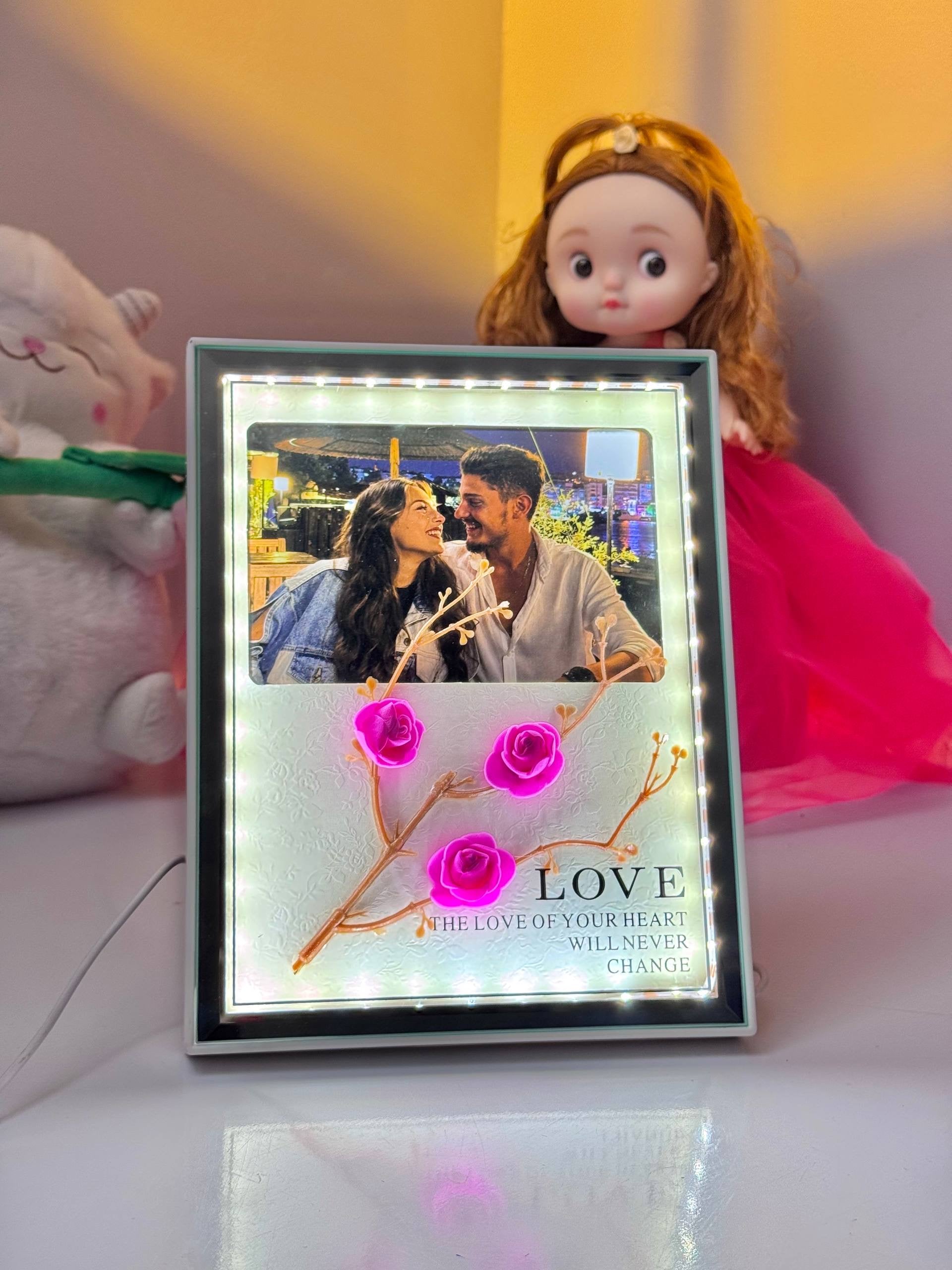 Personalized LED photo frame displaying a favorite memory with soft decorative lighting