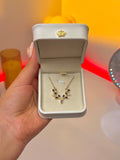 Elegant platinum necklace plated with gold in a branch\-inspired design with a crown leather jewelry box