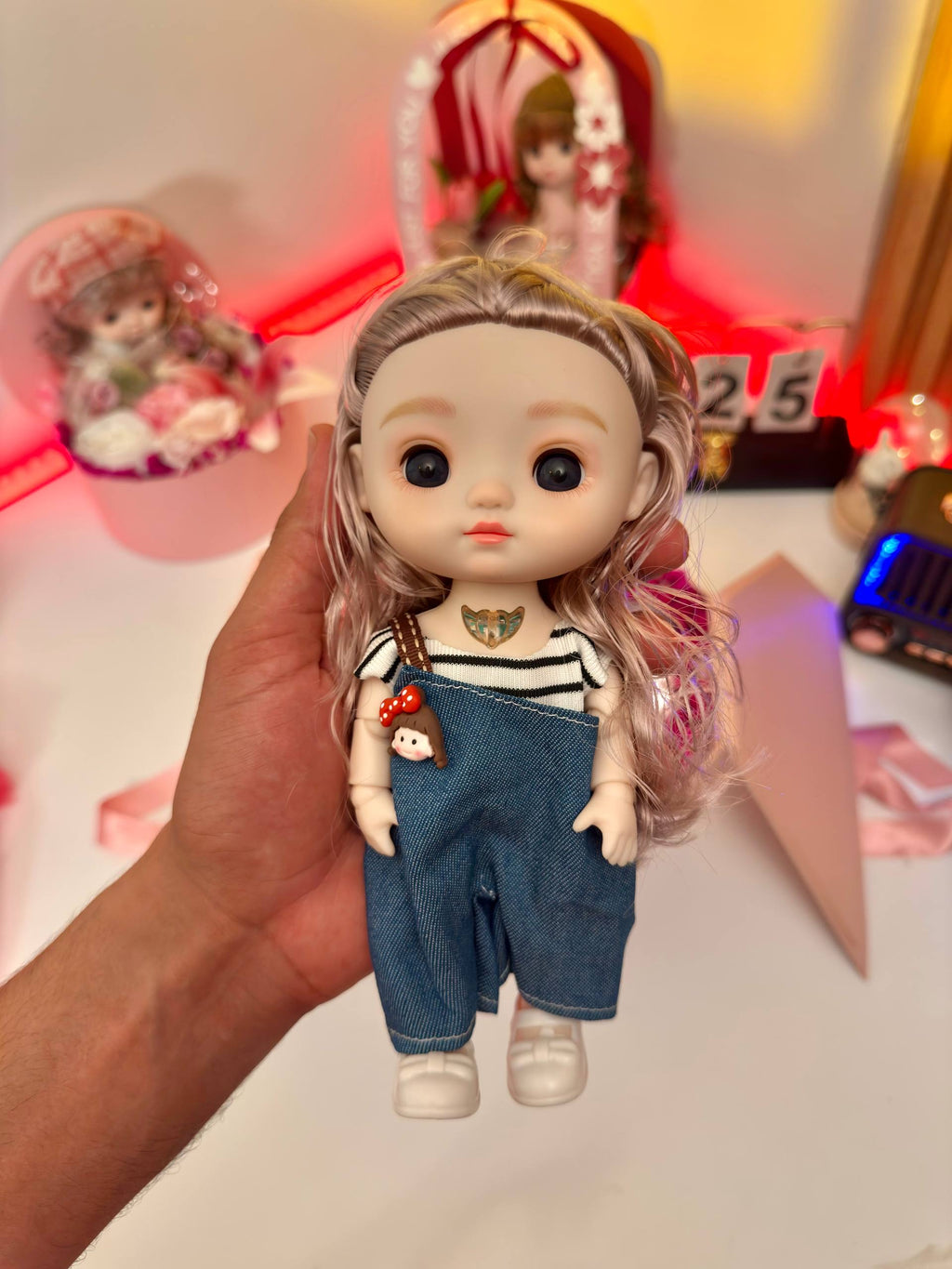 Cute mini doll with singing and light up functions