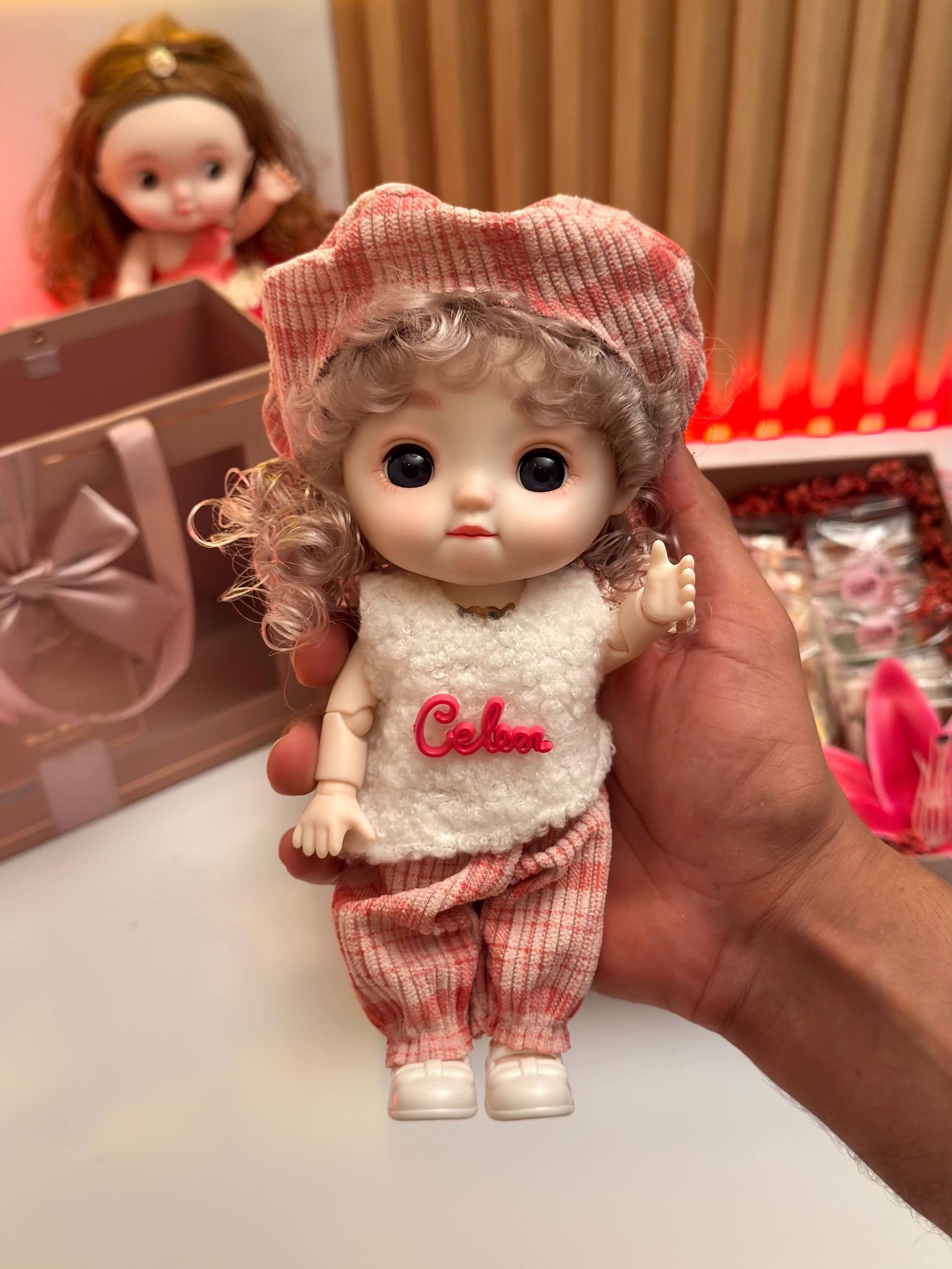 Cute mini doll with singing and light up functions